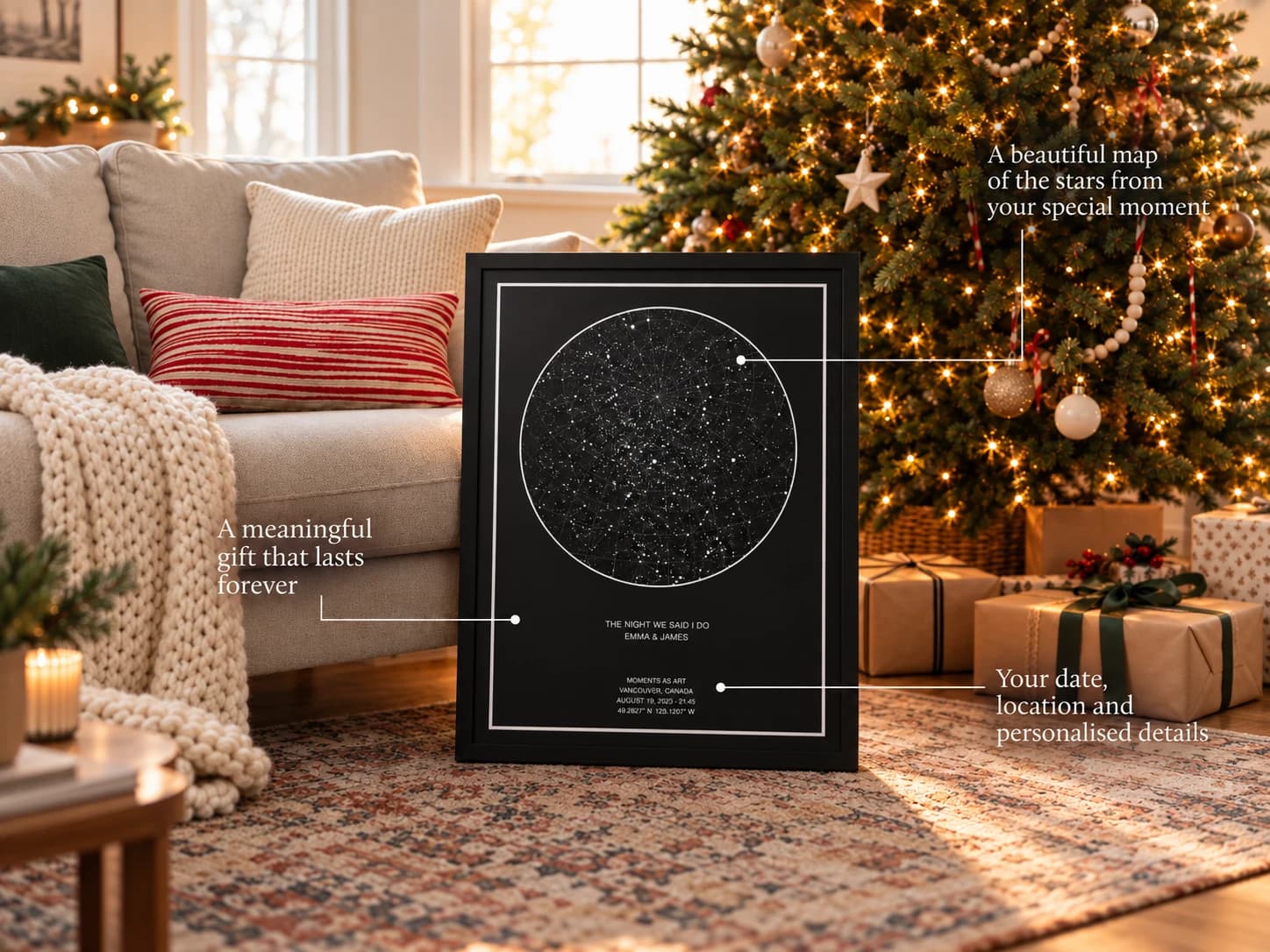A framed black star map titled The Night We Said I Do leaning against a sofa beside a lit Christmas tree and wrapped presents